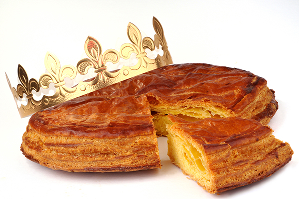 French galette des rois - king cake - puff pastry with almond paste inside for Mardi Gras